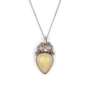 Victorian Rose Gold and Silver pear shaped Opal and Diamond Bow Pendant.