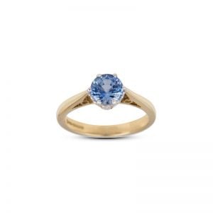18ct Yellow & White Gold Sapphire claw set single stone ring.