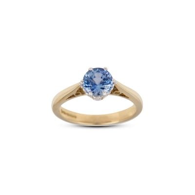 18ct Yellow & White Gold Sapphire claw set single stone ring.