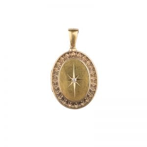 Victorian 15ct yellow gold oval locket with a singular diamond