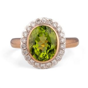 oval peridot and diamonds daisy ring