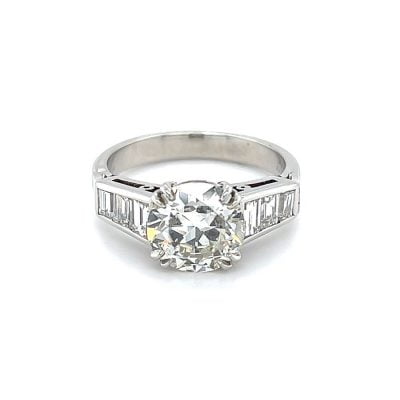 Art Deco Ring with Early Brilliant Central Diamond & Baguette Diamonds