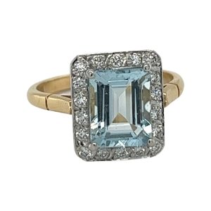 Emerald Cut Aquamarine & Diamond Surround Ring